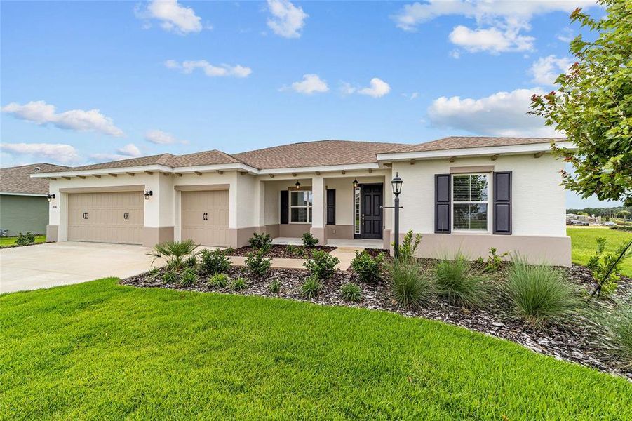 Exterior details and patio area of a home in On Top of the World Communities, Ocala (Image 25).