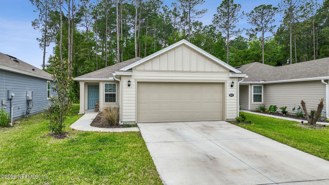 Front exterior of a new home in , Green Cove Springs, FL, highlighting curb appeal (Image 26).