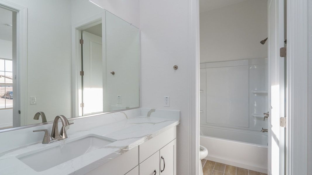 Furnished interior view inside a new home in Harmony at Montecito in Estrella, Goodyear (Image 11).