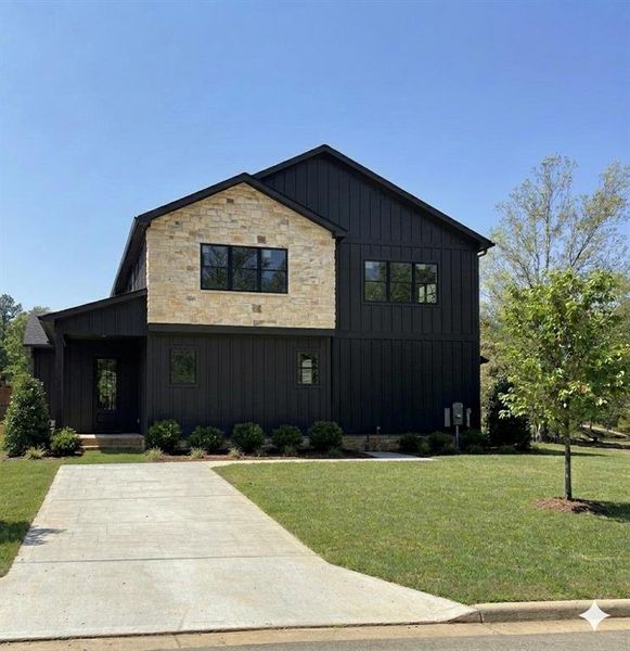 Front exterior of a new home in , Buford, GA, highlighting curb appeal (Image 17).