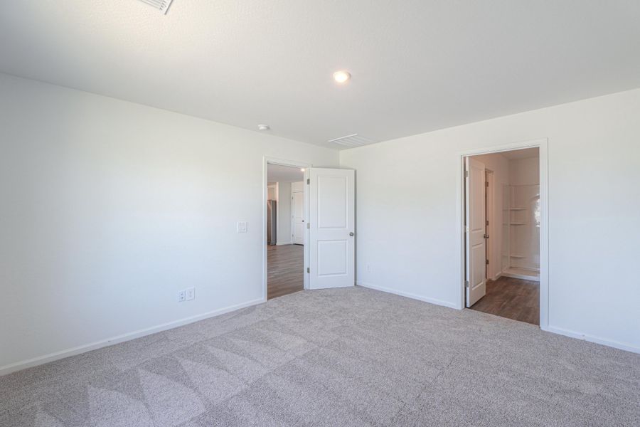 A hallway with white walls. A hallway with white walls.