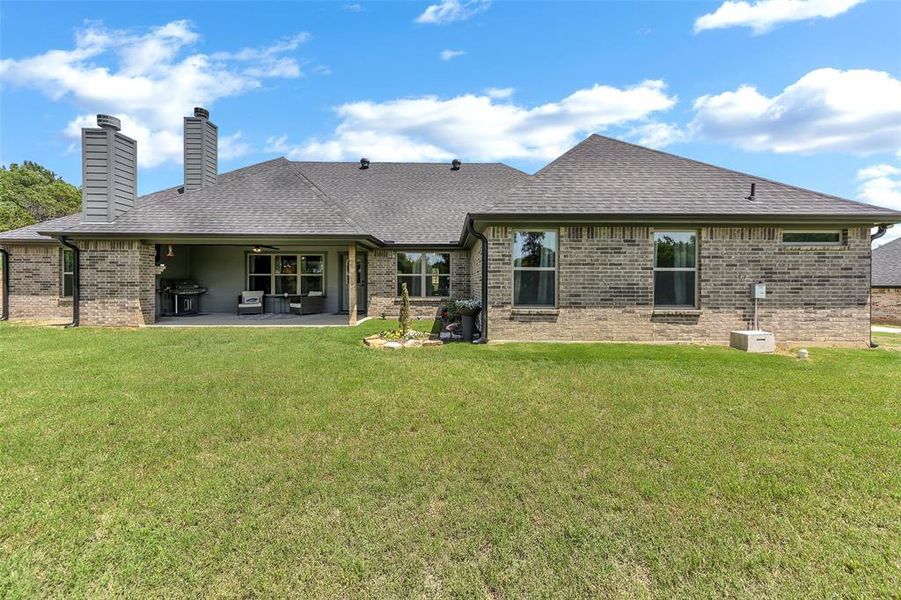 Exterior details and patio area of a home in , Weatherford (Image 28).