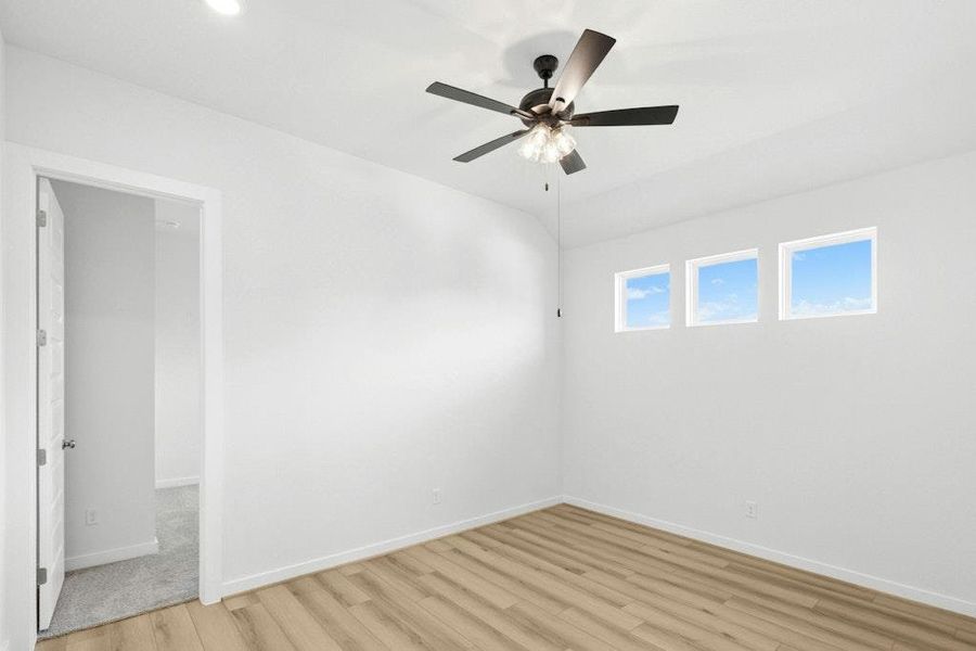 Spacious, unfurnished interior of a new home in The Colony, Bastrop (Image 14).