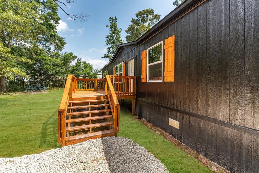 Exterior details and patio area of a home in , Conroe (Image 19).