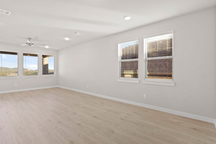 Living Room in the Willow home plan by Trophy Signature Homes – REPRESENTATIVE PHOTO