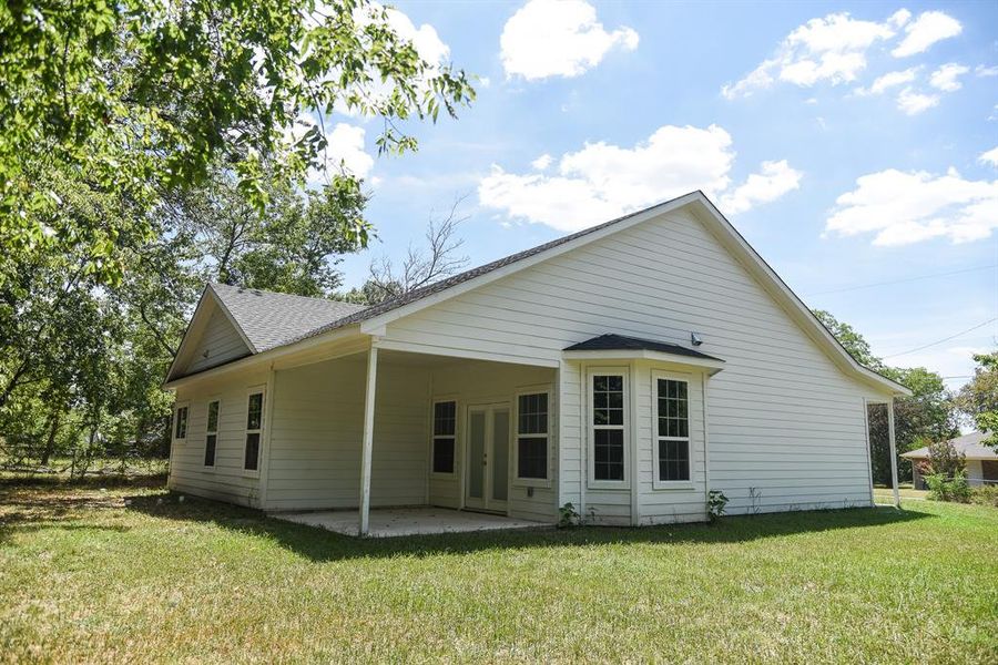 Exterior details and patio area of a home in , Commerce (Image 3). Exterior details and patio area of a home in , Commerce (Image 3).