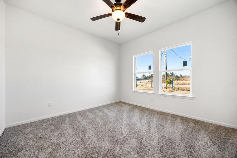 Bright and inviting third bedroom with plush carpeting and stunning views. Bright and inviting third bedroom with plush carpeting and stunning views.