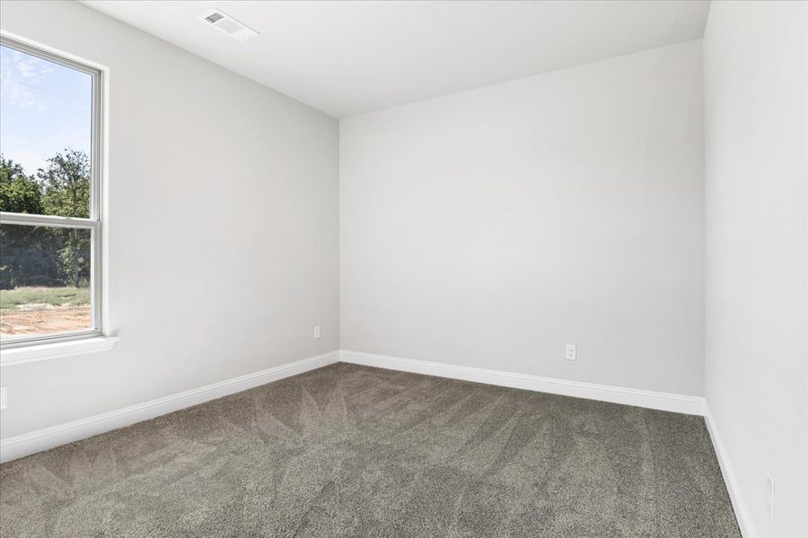 Spacious, unfurnished interior of a new home in The Ranches at Valley View, Springtown (Image 34).
