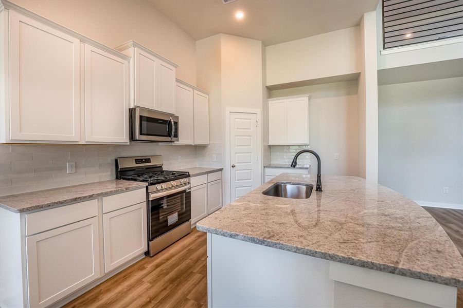 Furnished interior view inside a new home in Deer Pines, Conroe (Image 15).