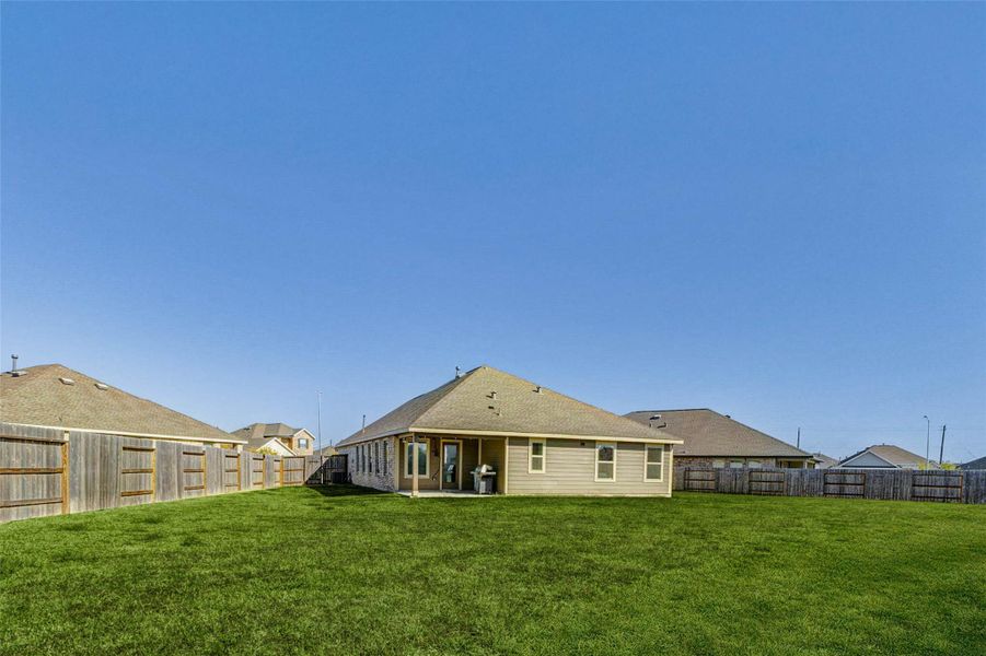 Exterior details and patio area of a home in , Baytown (Image 3).