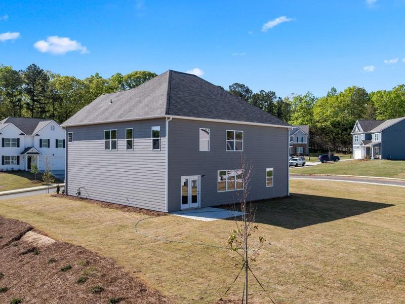 Front exterior of a new home in Thompson Ridge, Dallas, GA, highlighting curb appeal (Image 24).