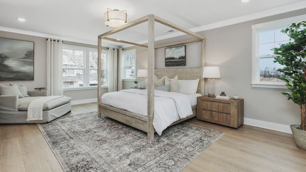 Stonefield home plan large primary suite with sitting room, walk-in closet and en suite bathroom Stonefield home plan large primary suite with sitting room, walk-in closet and en suite bathroom