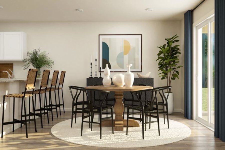 A dining room with a table and chairs. A dining room with a table and chairs.