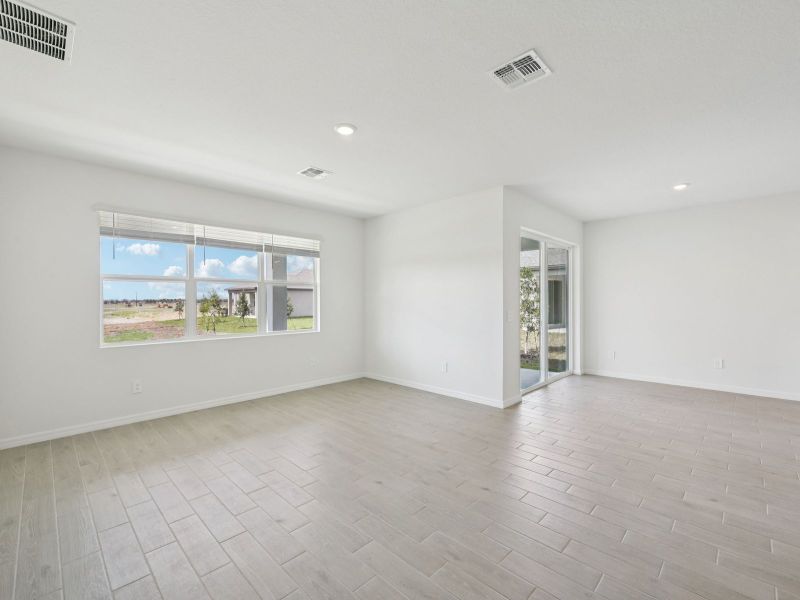 Spacious, unfurnished interior of a new home in Coasterra - Reserve Series, Palmetto (Image 11).