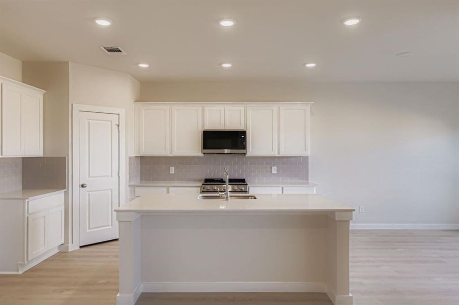Furnished interior view inside a new home in MiraVerde, Crowley (Image 6).