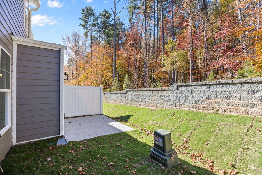Exterior details and patio area of a home in Harbor Crossing, Greensboro (Image 24).