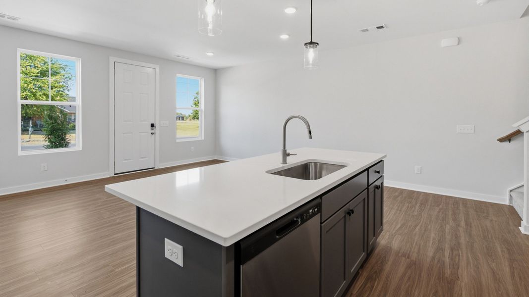 Kitchen with darker wash cabinetry