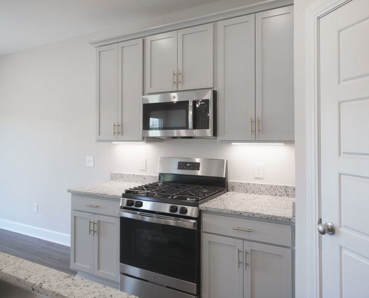 Representative furnished interior of a home built from the The Harper by Cothran Homes in Holly Ridge, Greenville (Image 6).