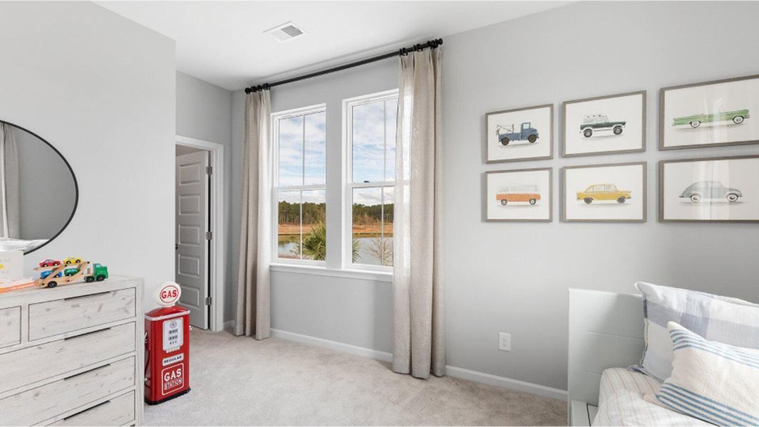Furnished interior view inside a new home in Sweetgrass at Summers Corner, Summerville (Image 14).