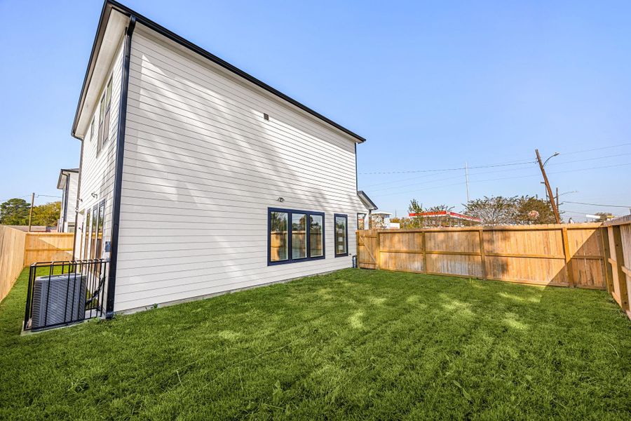 Exterior details and patio area of a home in , Houston (Image 4). Exterior details and patio area of a home in , Houston (Image 4).