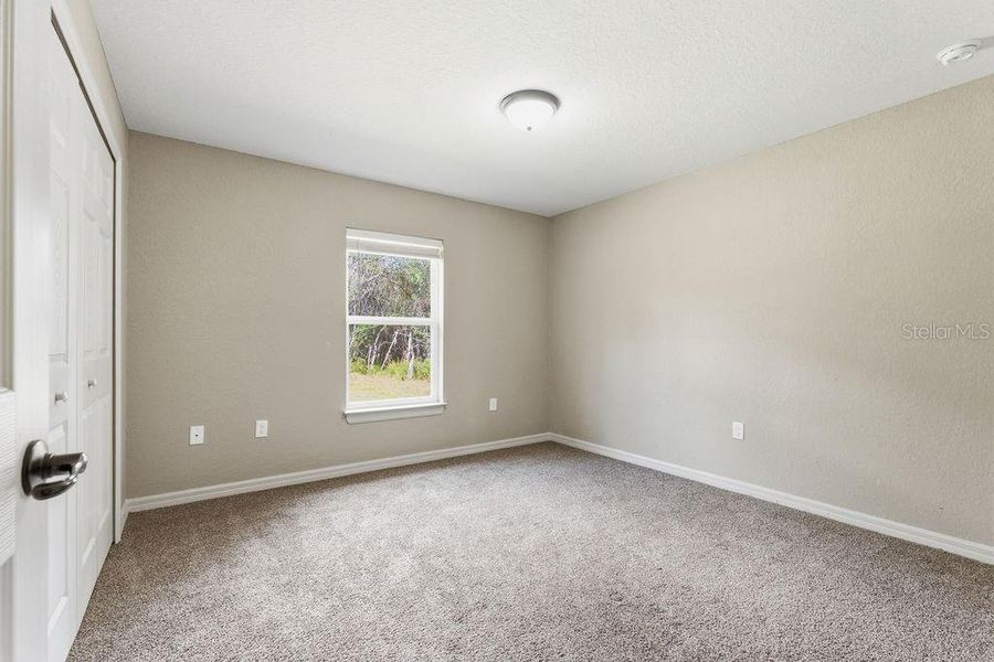Spacious, unfurnished interior of a new home in Marion Oaks, Ocala (Image 9).