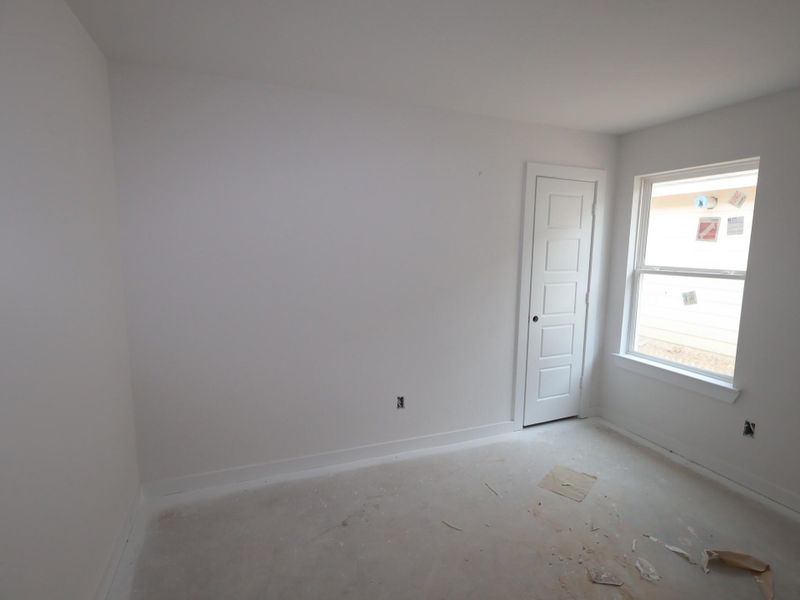 Spacious, unfurnished interior of a new home in Pinewood at Grand Texas, New Caney (Image 22).