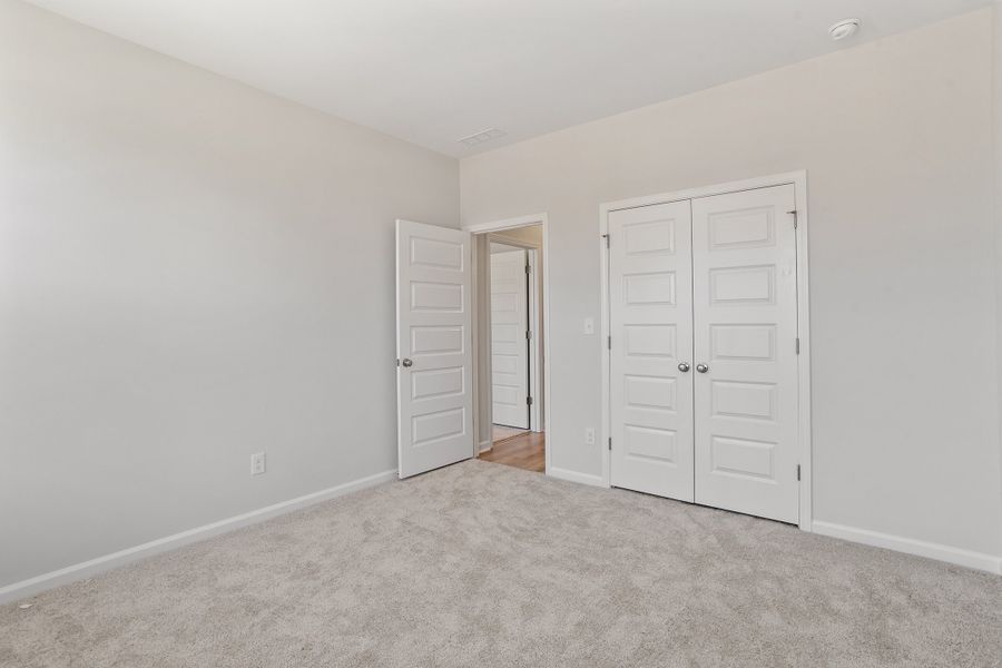 Spacious, unfurnished interior of a new home in Sweetbrier, Durham (Image 31).