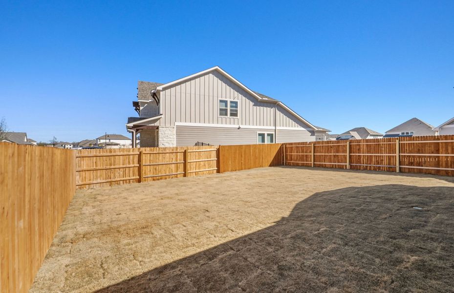 Exterior details and patio area of a home in Santa Rita Ranch, Liberty Hill (Image 3).