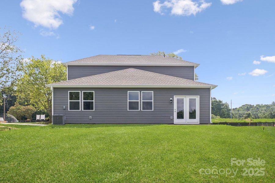 Front exterior of a new home in , Locust, NC, highlighting curb appeal (Image 1). Front exterior of a new home in , Locust, NC, highlighting curb appeal (Image 1).