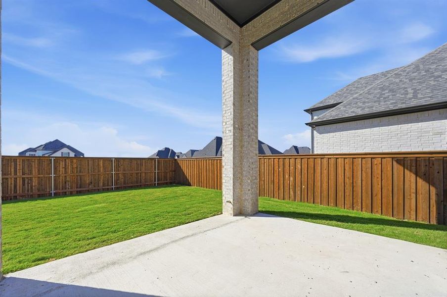 Exterior details and patio area of a home in Quail Hollow: 72ft. lots, Rockwall (Image 2).