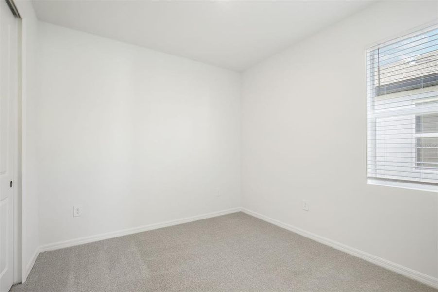 Spacious, unfurnished interior of a new home in Coasterra - Reserve Series, Palmetto (Image 17).