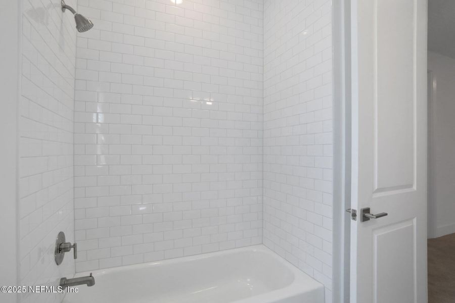 Furnished interior view inside a new home in North Beach Townhomes, Jacksonville Beach (Image 7).