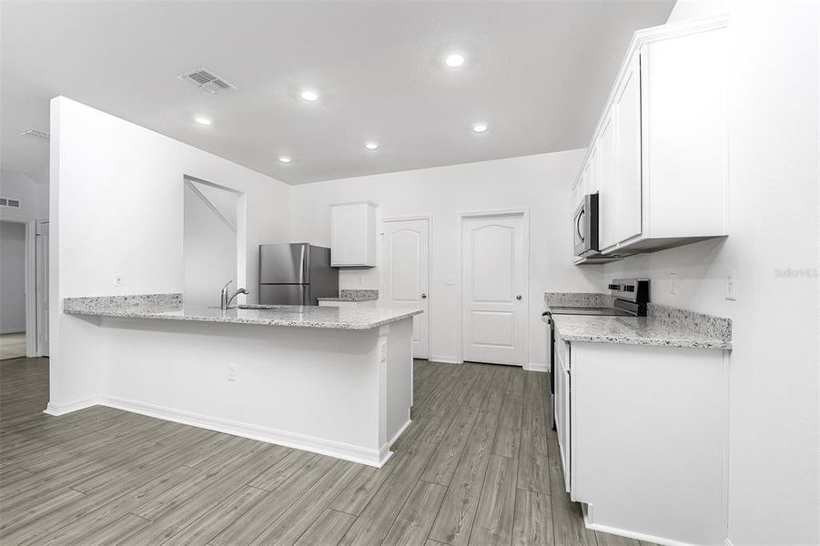 Furnished interior view inside a new home in Tula Parc, Astatula (Image 6). Furnished interior view inside a new home in Tula Parc, Astatula (Image 6).