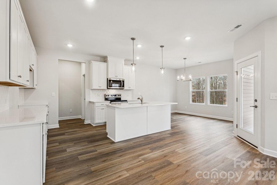 Furnished interior view inside a new home in , Statesville (Image 8).