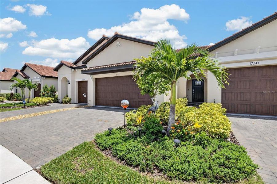 Front exterior of a new home in Southshore Bay Active Adult, Wimauma, FL, highlighting curb appeal (Image 24).