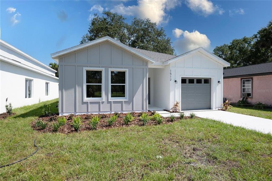 Front exterior of a new home in , Sanford, FL, highlighting curb appeal (Image 20).
