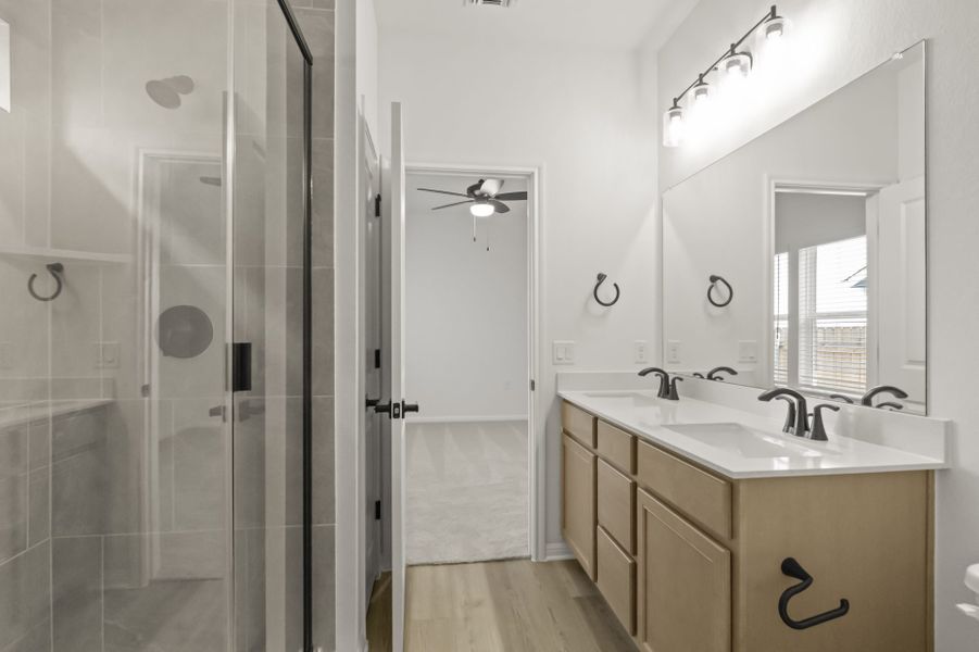 Furnished interior view inside a new home in Whisper Valley, Manor (Image 11).