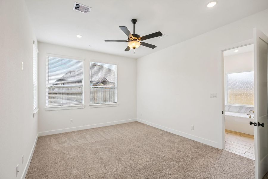 Spacious, unfurnished interior of a new home in The Trails 50's, New Caney (Image 17).