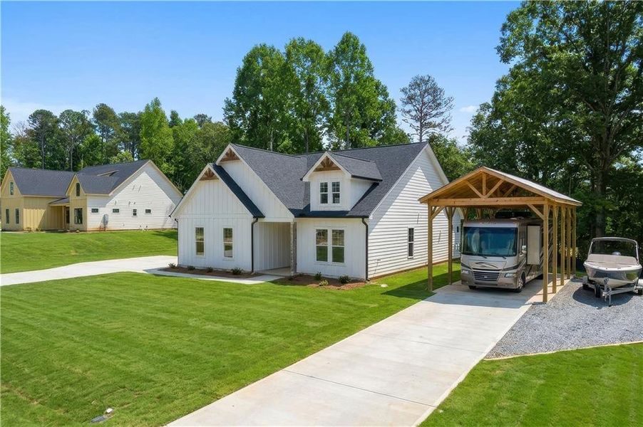 Front exterior of a new home in , Gainesville, GA, highlighting curb appeal (Image 2). Front exterior of a new home in , Gainesville, GA, highlighting curb appeal (Image 2).
