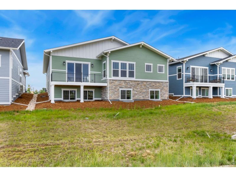 Exterior details and patio area of a home in Villa Collection, Fort Collins (Image 4).
