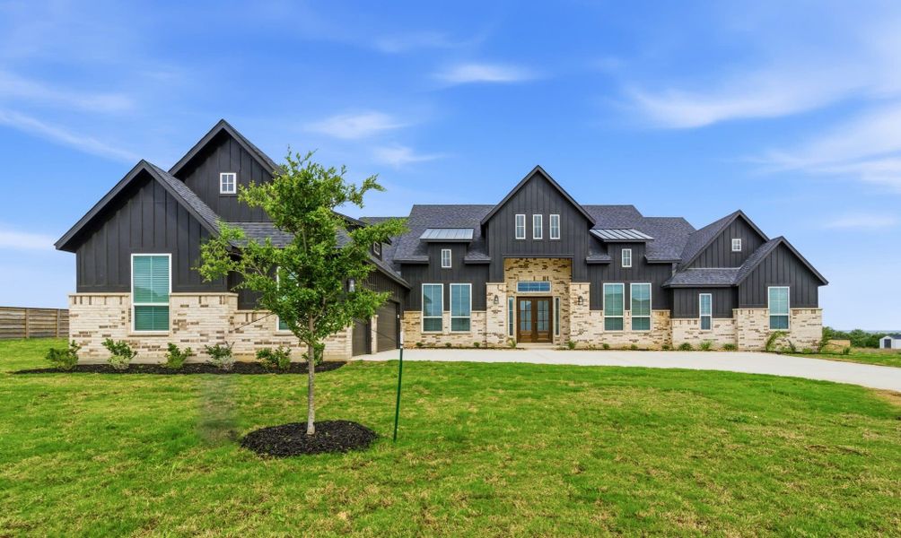 Front exterior of a new home in Regency Ranch, Marion, TX, highlighting curb appeal (Image 28).