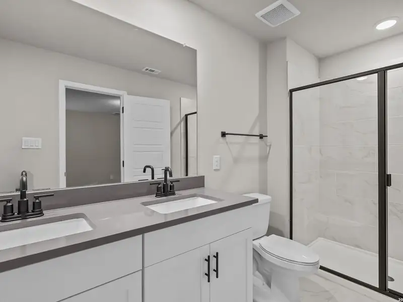 Furnished interior view inside a new home in Bricewood, San Antonio (Image 18).