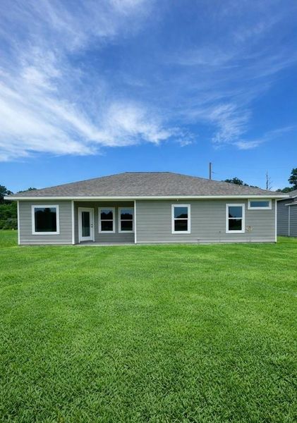 Exterior details and patio area of a home in , Trinity (Image 3).