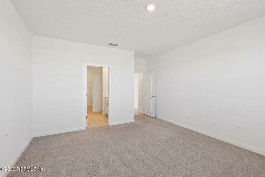 Spacious, unfurnished interior of a new home in Lakes at Bella Lago - Signature Series, Green Cove Springs (Image 33).