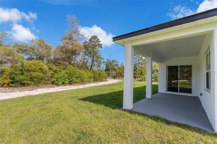 Exterior details and patio area of a home in , Ocala (Image 4).