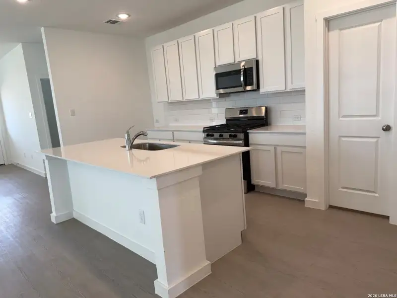 Furnished interior view inside a new home in Rose Valley, Converse (Image 3).
