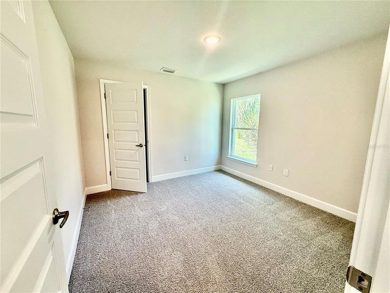 Spacious, unfurnished interior of a new home in South Gulf Cove, Port Charlotte (Image 17).