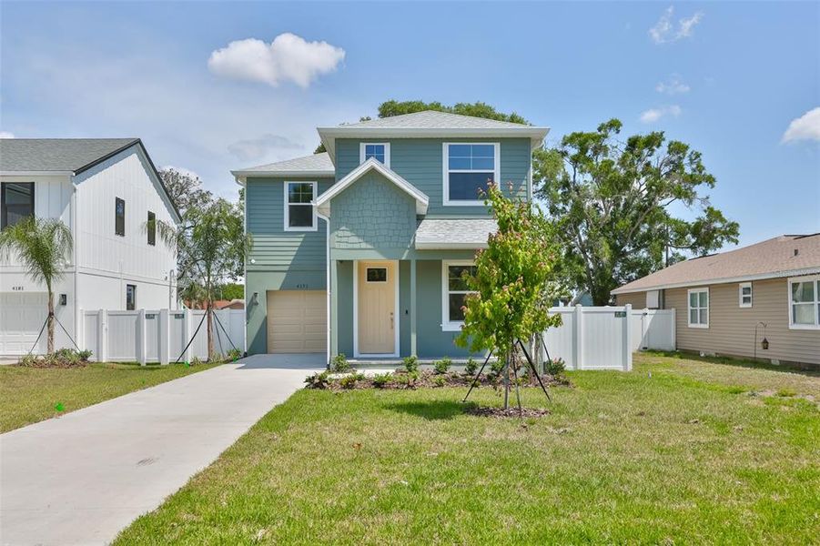 Front exterior of a new home in , St. Petersburg, FL, highlighting curb appeal (Image 2). Front exterior of a new home in , St. Petersburg, FL, highlighting curb appeal (Image 2).