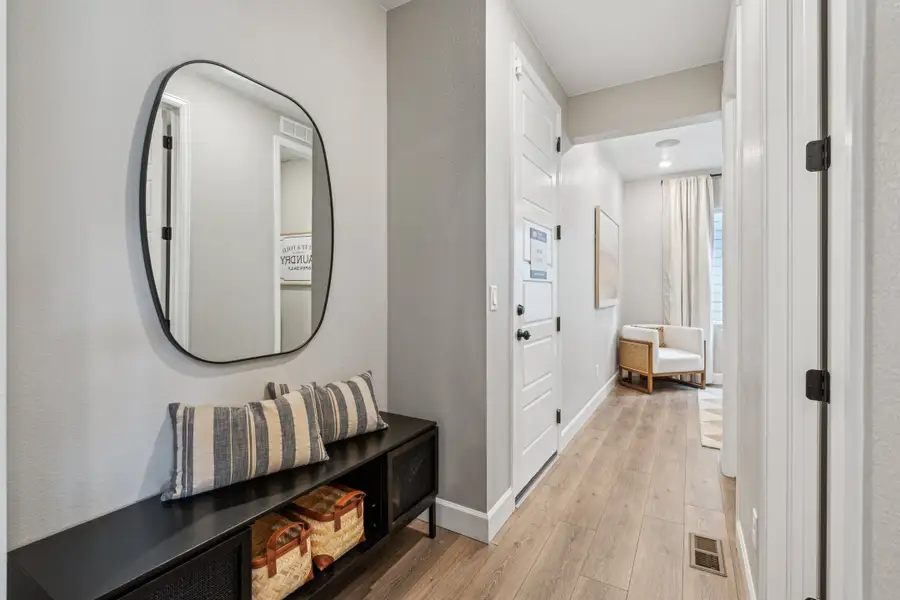 Furnished interior view inside a new home in Trailstone, Arvada (Image 36).