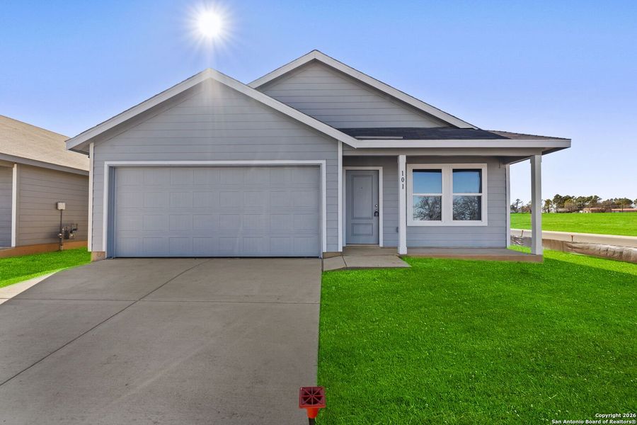 Front exterior of a new home in Friendship Oaks, Fredericksburg, TX, highlighting curb appeal (Image 1). Front exterior of a new home in Friendship Oaks, Fredericksburg, TX, highlighting curb appeal (Image 1).